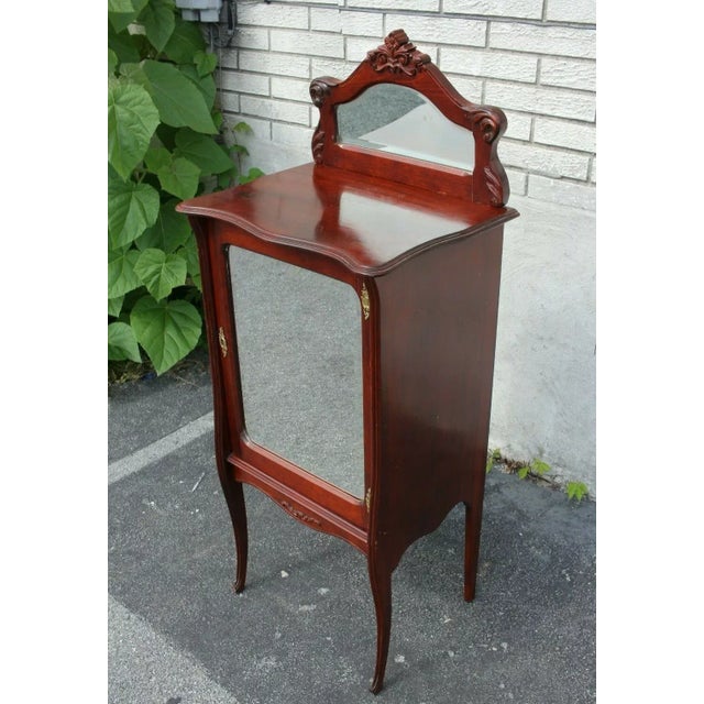 Step back in time with this magnificent 19th Century Cherrywood Cabinet. An embodiment of antique elegance, this piece is...