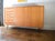 This sideboard is a WK Möbel original from the 1960s. The cabinet features a high-quality oak veneer. The veneer was...