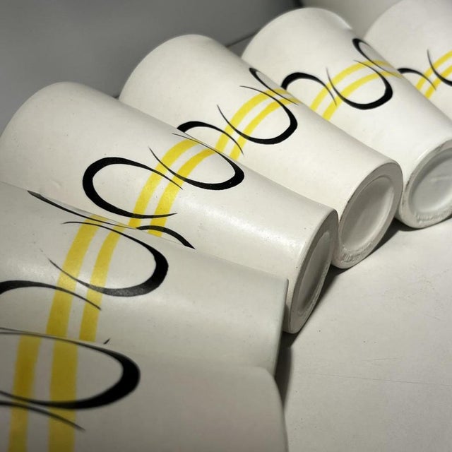 André baud in vallauris, ceramic set with pitcher and 6 cups, ca. 1960. Each piece features hand-painted decoration, with...