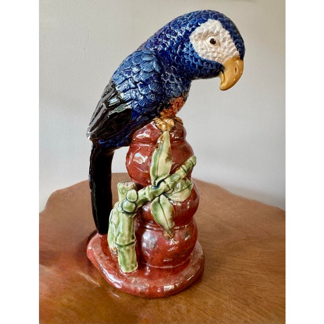 Vintage Italian majolica ceramic parrot, beautifully hand-painted and glazed in brilliant shades of blue and black....