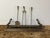 Design Plus Gallery presents a Vintage Brass Fireplace Fender + Three-Piece Tool Set. The long rectangular fender displays...