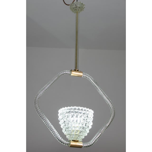Incredible Murano glass Light in clear rostrato from the middle of the last century. This wonderful light was produced in...