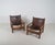 A set of armchairs from France, made in the 1970s. These armchairs have a beautiful olive wood frame with a brown saddle...