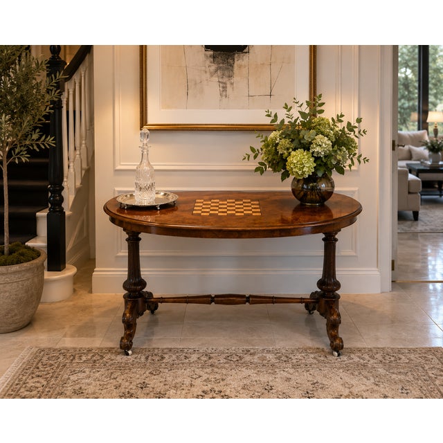 A superb quality antique Victorian burr walnut centre table dating to around 1860. The beautifully figured burr walnut...