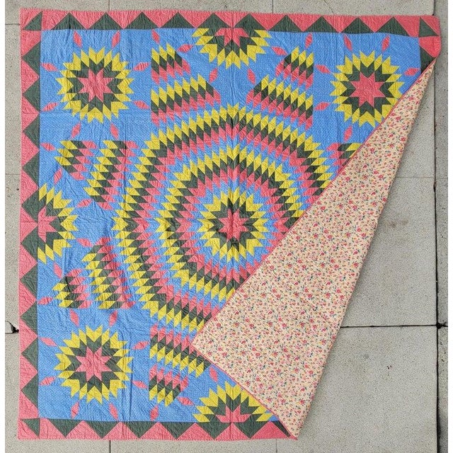 This fine 19thc Pennsylvania Berks County Pennsylvania eight point star with surrounding star bursts and an amazing double...