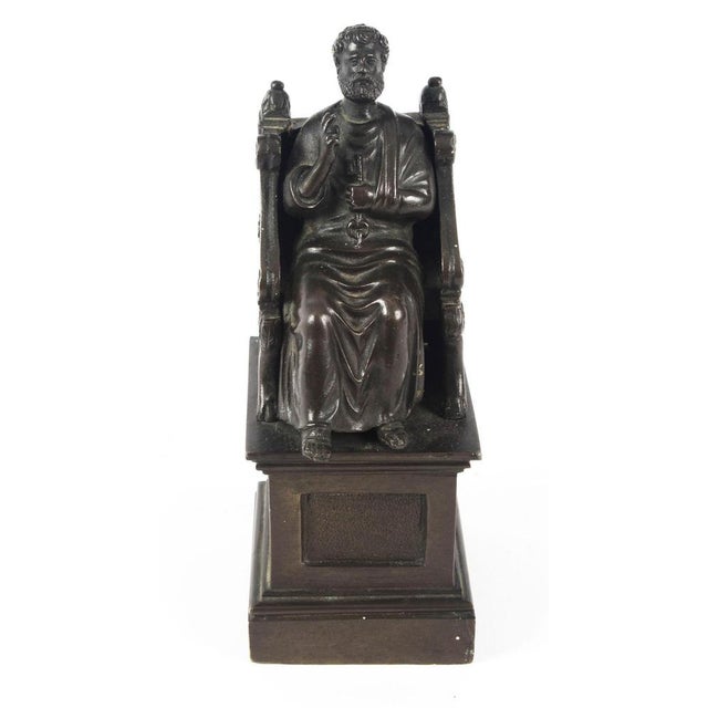 A superb antique italian grand tour patinated bronze sculpture of st peter seated on a bronze throne, circa 1880 in date....