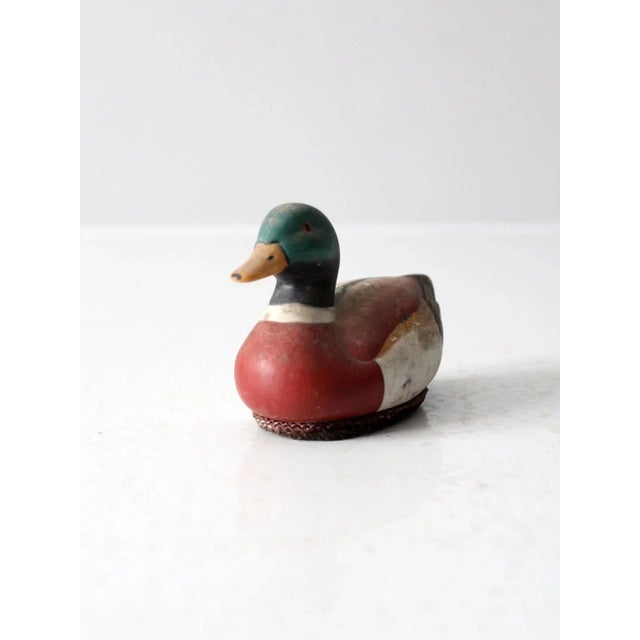 This is a mid 20th century hand-painted wood duck-shaped lint brush. Function and decorative, the wooden duck figure has...