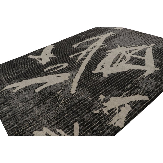 Hand-knotted in wool, this 9x12 modern rug is a new addition to the Homage Collection by Rug & Kilim. On the Design: A...