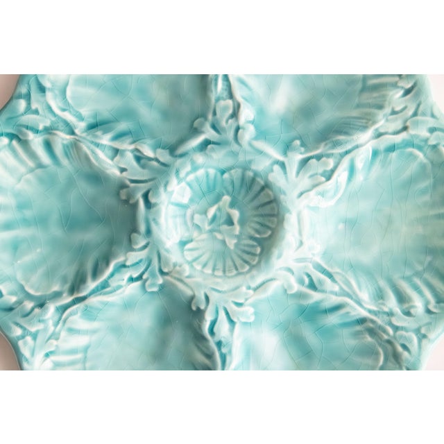 A gorgeous Mid-Century French Gien turquoise aqua blue-green glazed oyster plate, fluted at the edges. Area of the Loire...