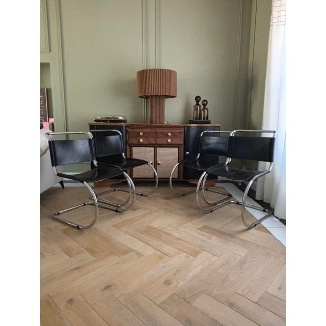 Set of four MR10 chairs, designed by Ludwig Mies van der Rohe, true icons of Bauhaus design. Their frame is made of...