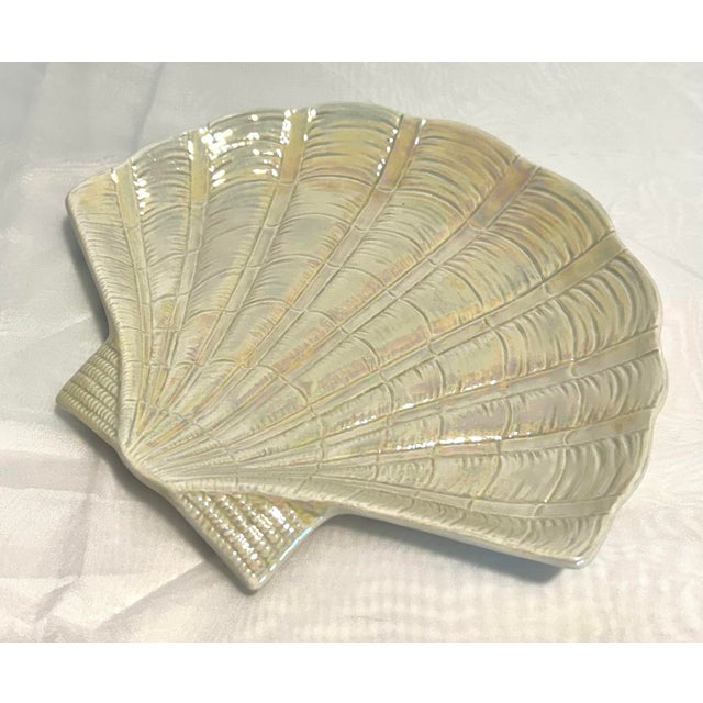 A gorgeous set of four vintage Fitz and Floyd seashell plates, beautifully sculpted with an organic, coastal-inspired form...