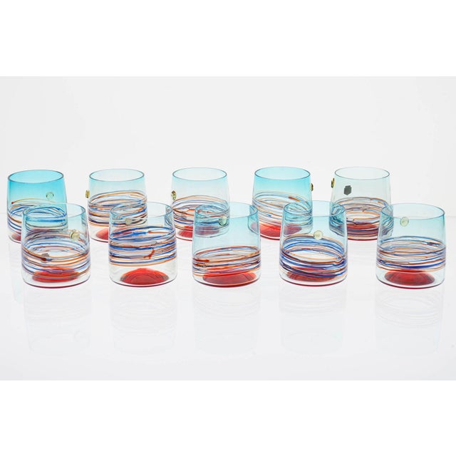This set of 10 Cenedese cocktail/whisky glasses, meticulously crafted in the renowned Murano glassmaking tradition, is a...