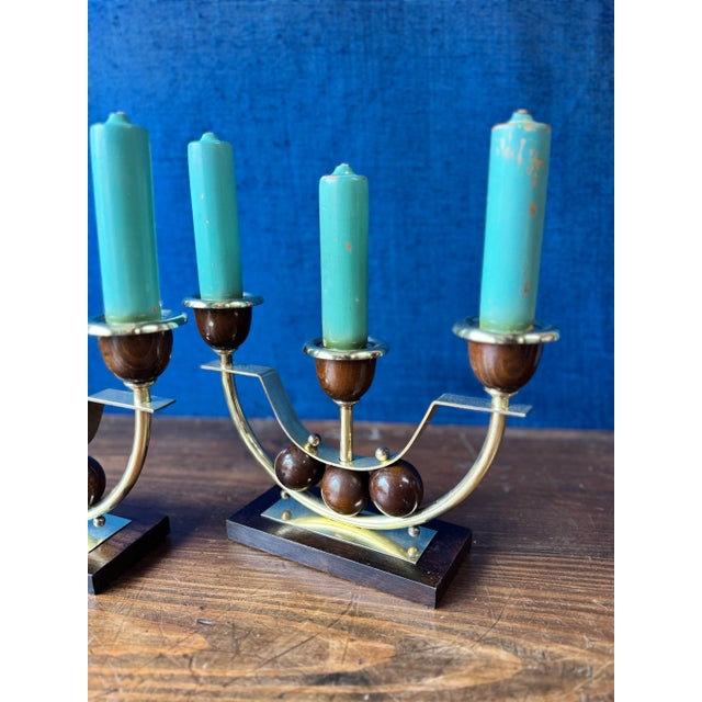 Understated elegance and sculptural lines characterize this superb pair of minimalist Art Deco candlesticks, dating from...