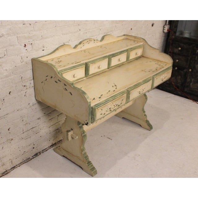 Hand-painted cream and olive green, this desk is decorated with a sweet collection of nature motifs. Dragonflies buzz over...