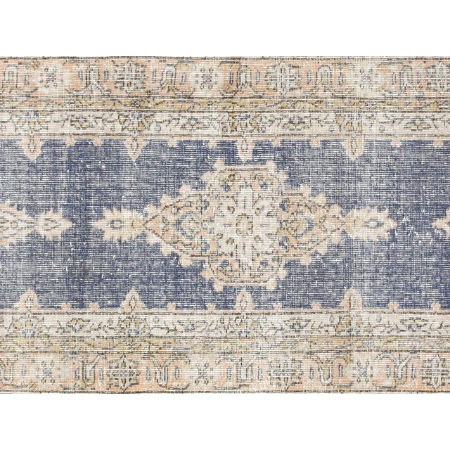 This Vintage Turkish Oushak Runner is the perfect way to add texture and antique flair to any living space. Crafted with...