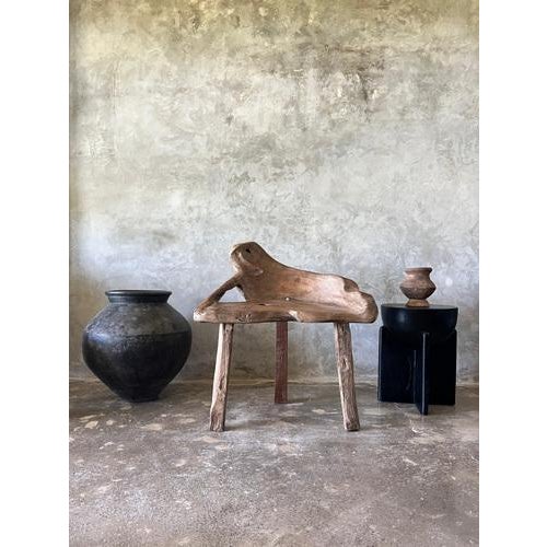 End table, stool in solid blackened (burned) mango wood, semi-circular seat with crossed base. Diameter of the seat or...