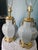Stunning vintage Morris Greenspan-Hollywood Regency Chinoiserie style porcelain table lamps. The lamps are accented with...
