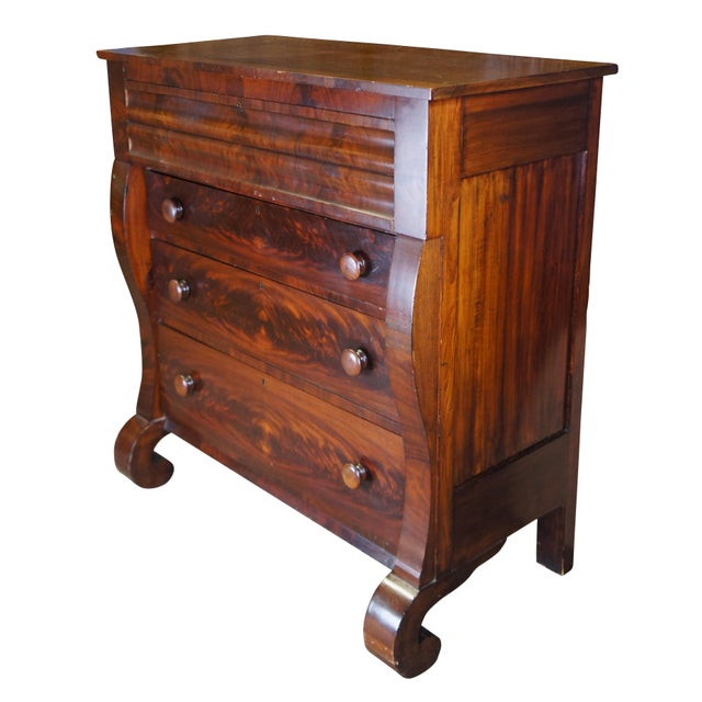 Mid to late 19th century American Empire tallboy / highboy chest. Made of flame / crotch mahogany featuring rectangular...