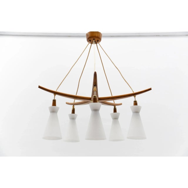 Scandic Wood and Opal Glass Ceiling Lamp, 1960s The lamp is executed with 5 x E14 Edison screw fit bulbs. It is wired and...