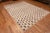 A Beautiful And Decorative Ivory Cream Background With Light Brown Color Tribal Geometric Checkerboard Pattern Modern Room...