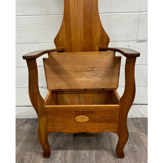 This is an antique American oak hall tree from the early 1900s, designed in the Arts and Crafts style with Art Nouveau-...
