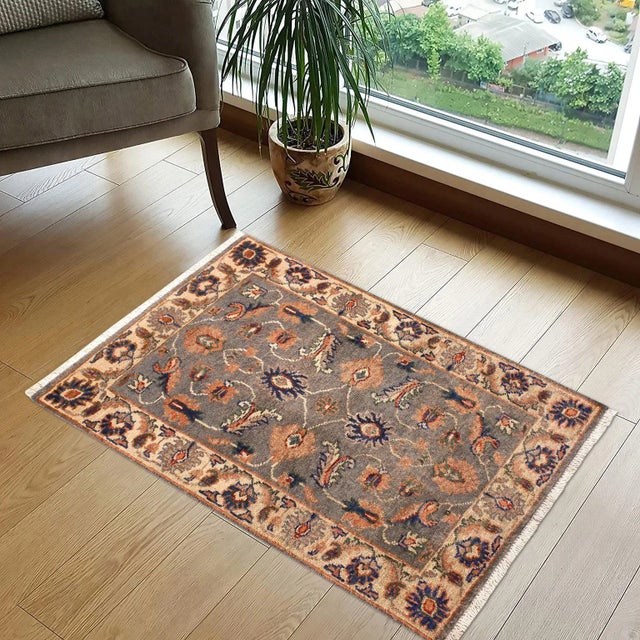 "Enhance the ambiance of your home with this magnificent Persian-influenced Turkish hand-knotted rug made by skilled...