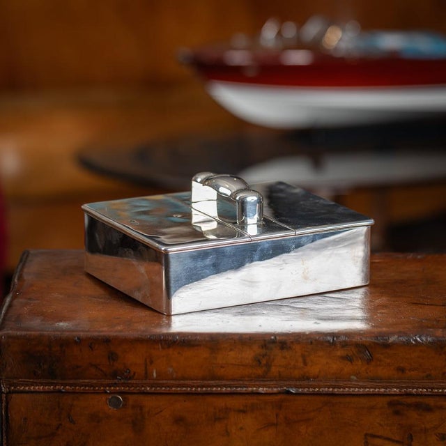 Antique 19th Century Victorian solid silver cigar box. Elegantly crafted, this box features a shaped central handle and...