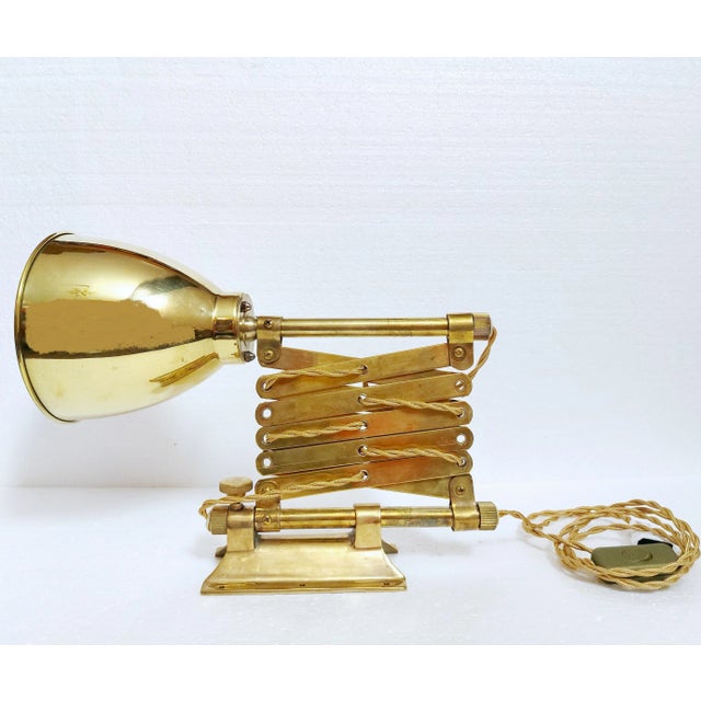 Very rare vintage ship or industrial, large and massive lamp, quality made of solid brass. The lamp is made entirely of...