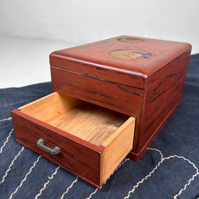 Beautiful lacquered writing box with a drawer and storage space with a lid from the 1950s. Dimensions: height 12 cm, width...
