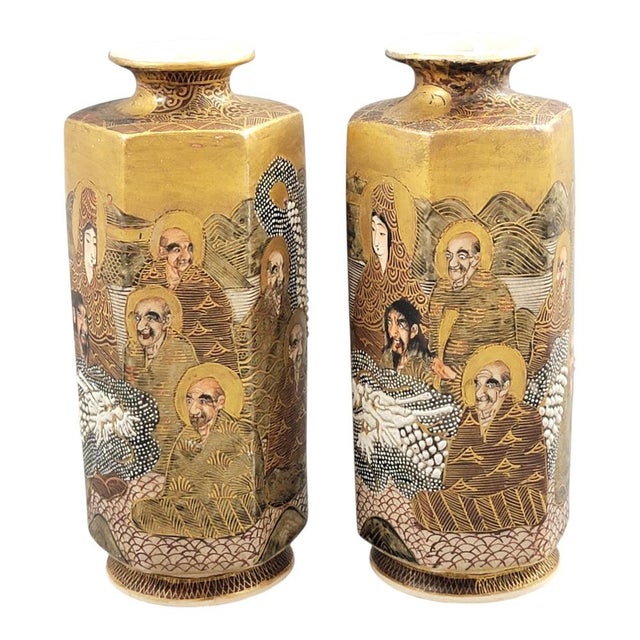 This pair of Japanese Satsuma vases is particularly appealing because it is a true pair, with both pieces matching in...