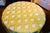 Beautiful round cover for a round dining room table or kitchen table measuring 60" in diameter. The photo displays a small...