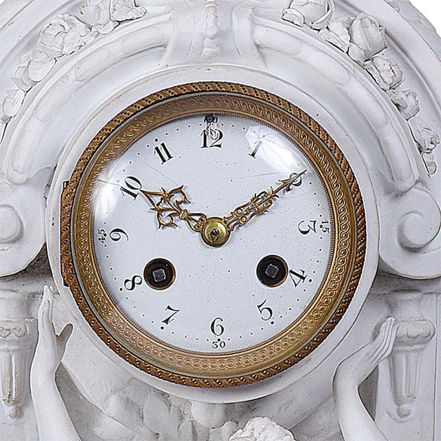Antique European Art Nouveau bisque porcelain mantel clock, circa 1890. This antique mantel clock is beautifully crafted...