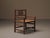 Solid wood armchair presents an interesting balance between modernist restraint and rural tradition. The structure,...