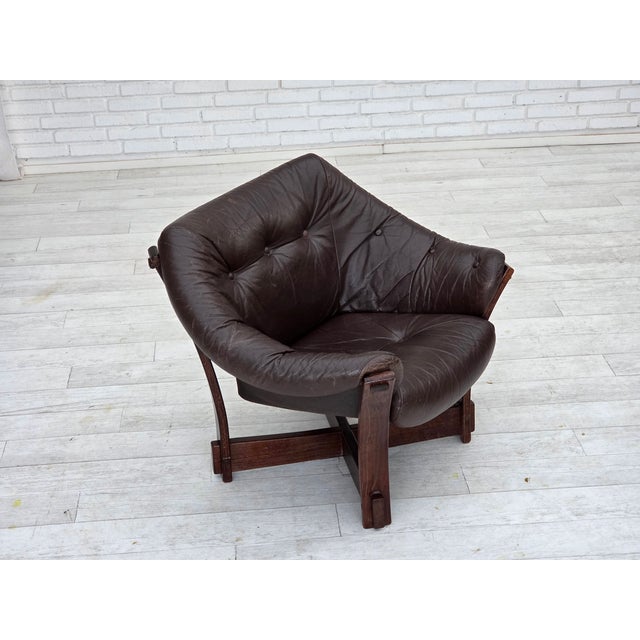 1970s, Scandinavian lounge chair. Original brown furniture leather, canvas, dark oak wood. Original good condition: no...