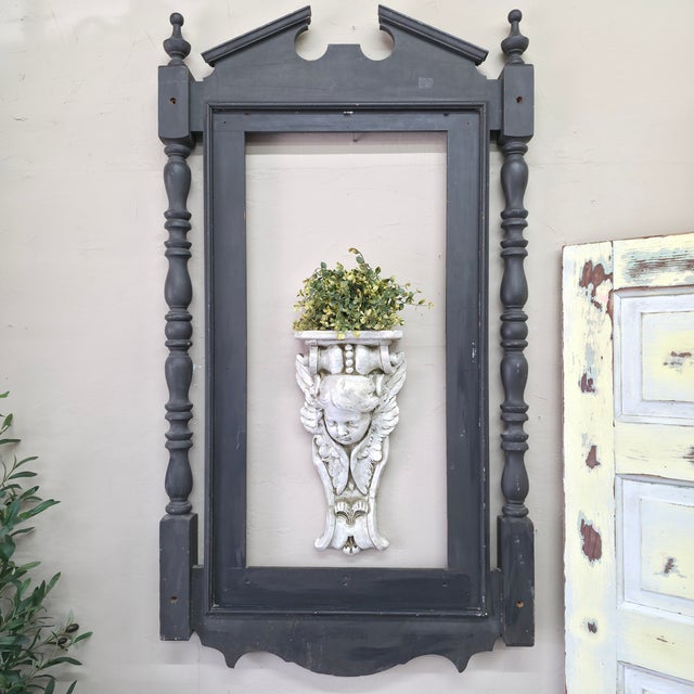 Tall and architectural, this Victorian-style pier mirror frame brings serious presence to a wall even without glass. The...