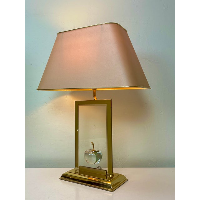 Le Dauphin, France. "La Pomme" table lamp in clear art glass and brass, 1970s. Very decorative, with authentic lampshade....