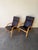Elegant pair of vintage Danish lounge chairs by Stouby, made in Denmark and upholstered in original dark leather. These...