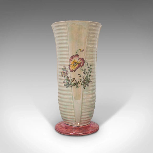 This is a vintage flower vase. An English, ceramic, decorative vase with lustre finish, dating to the mid-20th century,...