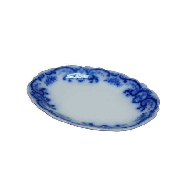 This authentic late Victorian oval serving platter produced between 1891 and 1914 by W.H. Grindley & Co. at the Newfield...