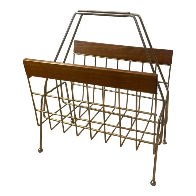 1960s Mid-Century Modern Brass Toned Wire and Wood Magazine Rack With Sculptural Handle. For Sale