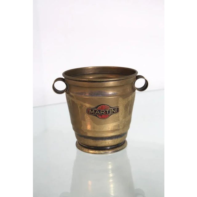 Elegant Italian nickel-plated brass ice cube holder made by Martini. On the front of the ice cup we find their Martini. At...