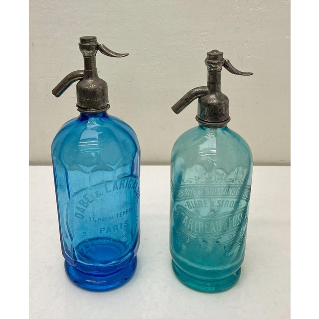 Antique Blue Glass Soda Siphon Bottles – Stunning Collectible Décor. Two Antique French soda/ syphons from the 1920s...
