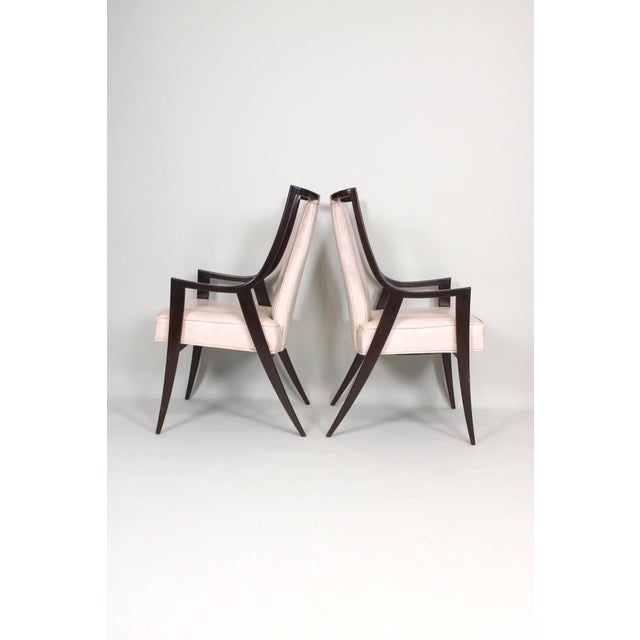 Set of 4 sleek ebonized mahogany armchairs by Harvey Probber. These are intended as dining chairs but can easily and...