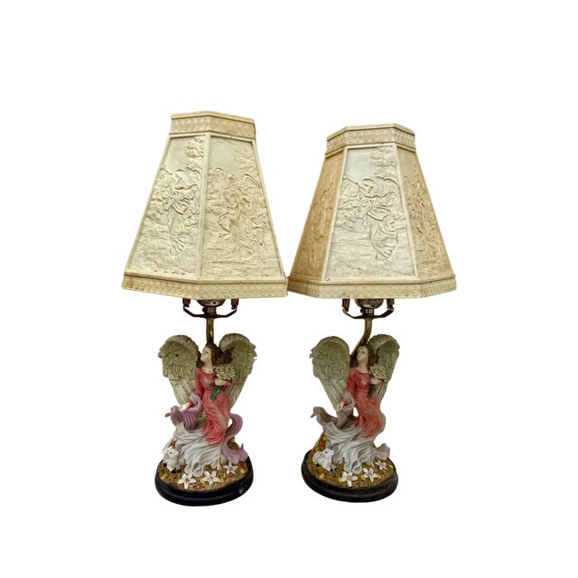 The cutest perfect angle lamps with original shades when turned on show multiple colorful images through the plastic shades.