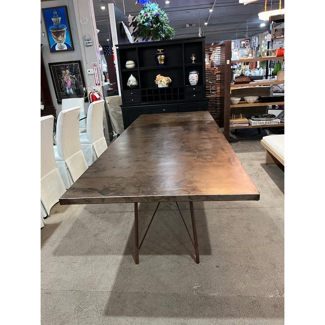 Make a bold statement in your dining space with this stunning 114-inch Roman Dining Table by Four Hands. Combining...