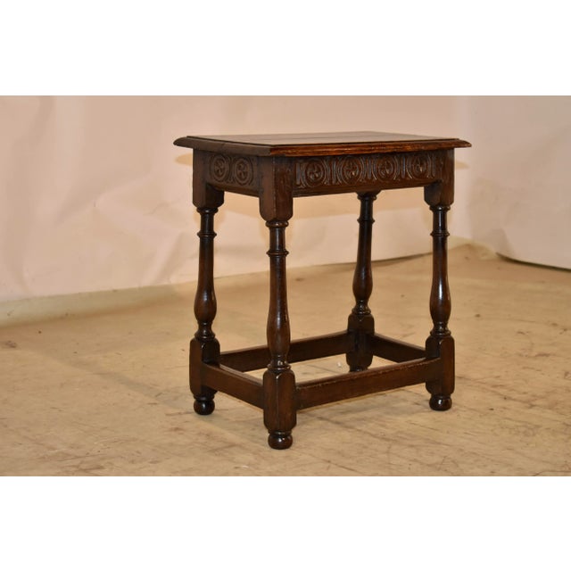 18th century oak joint stool from England. The top is pegged and has a beveled edge, following down to a lovely hand-...