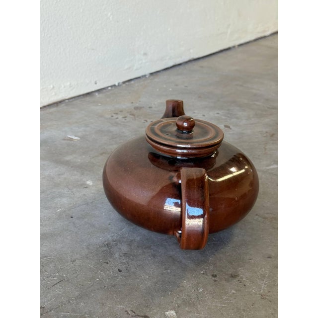 This vintage Knabstrup Keramik teapot from Denmark showcases the timeless beauty of Scandinavian studio pottery. Crafted...