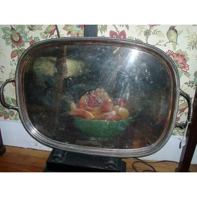 A fine and quite large Old Sheffield silver on copper two handled tray with gadrooned rim and central armorial crest with...