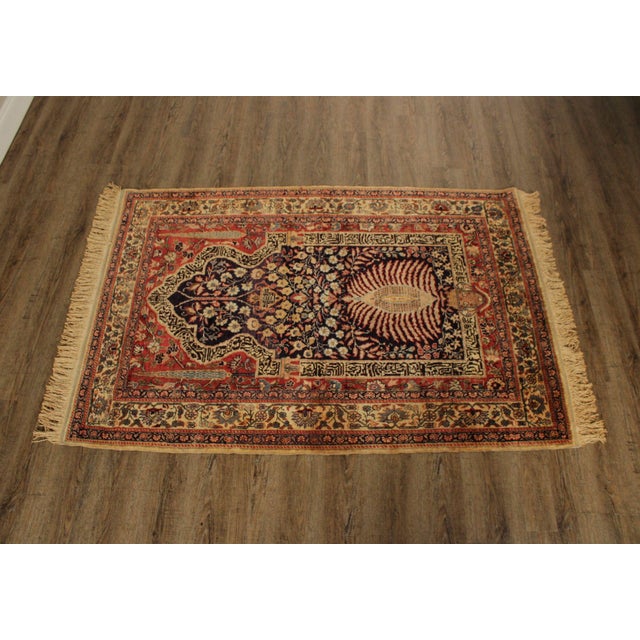 High Quality Hand Knotted Wool Area Rug Featuring A Central Figural And Floral Medallion Field Surrounded By Multiple...