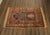High Quality Hand Knotted Wool Area Rug Featuring A Central Figural And Floral Medallion Field Surrounded By Multiple...